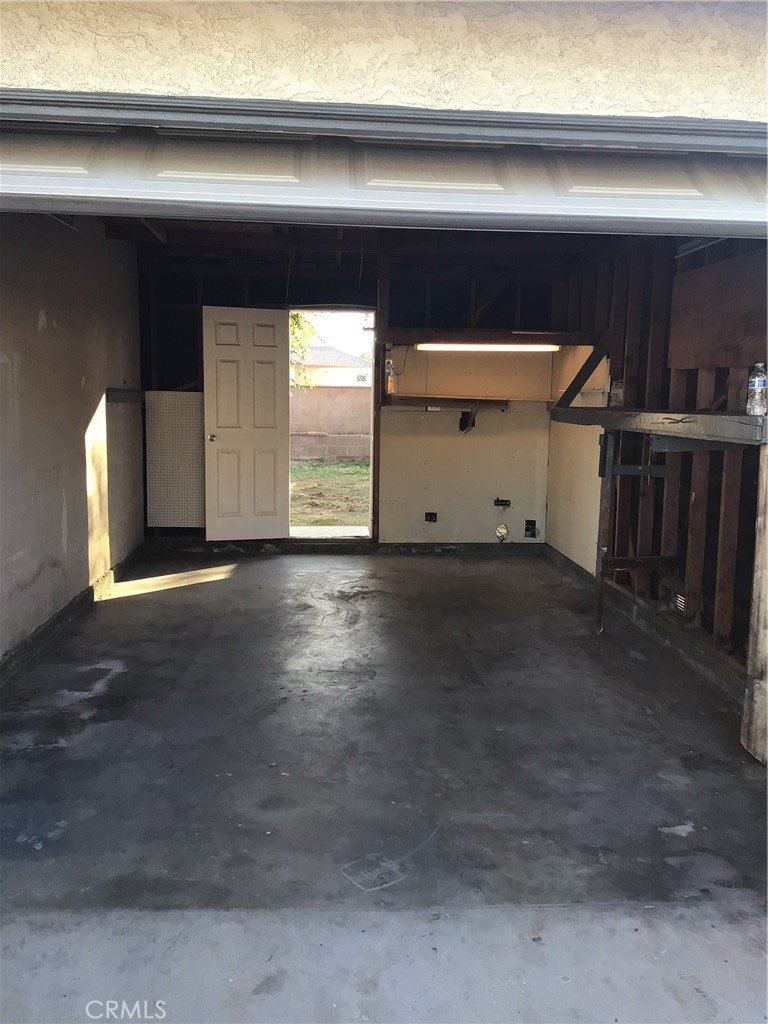 1202 West Lumber Street Lancaster, CA 93534 - Photo 13 of 16 a view of a garage
