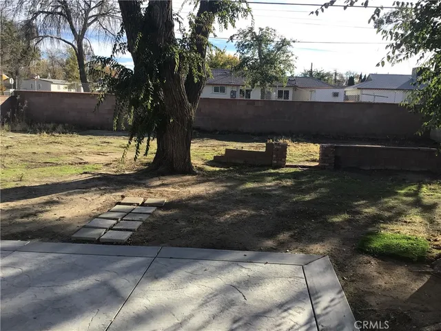 a view of swimming pool with a yard