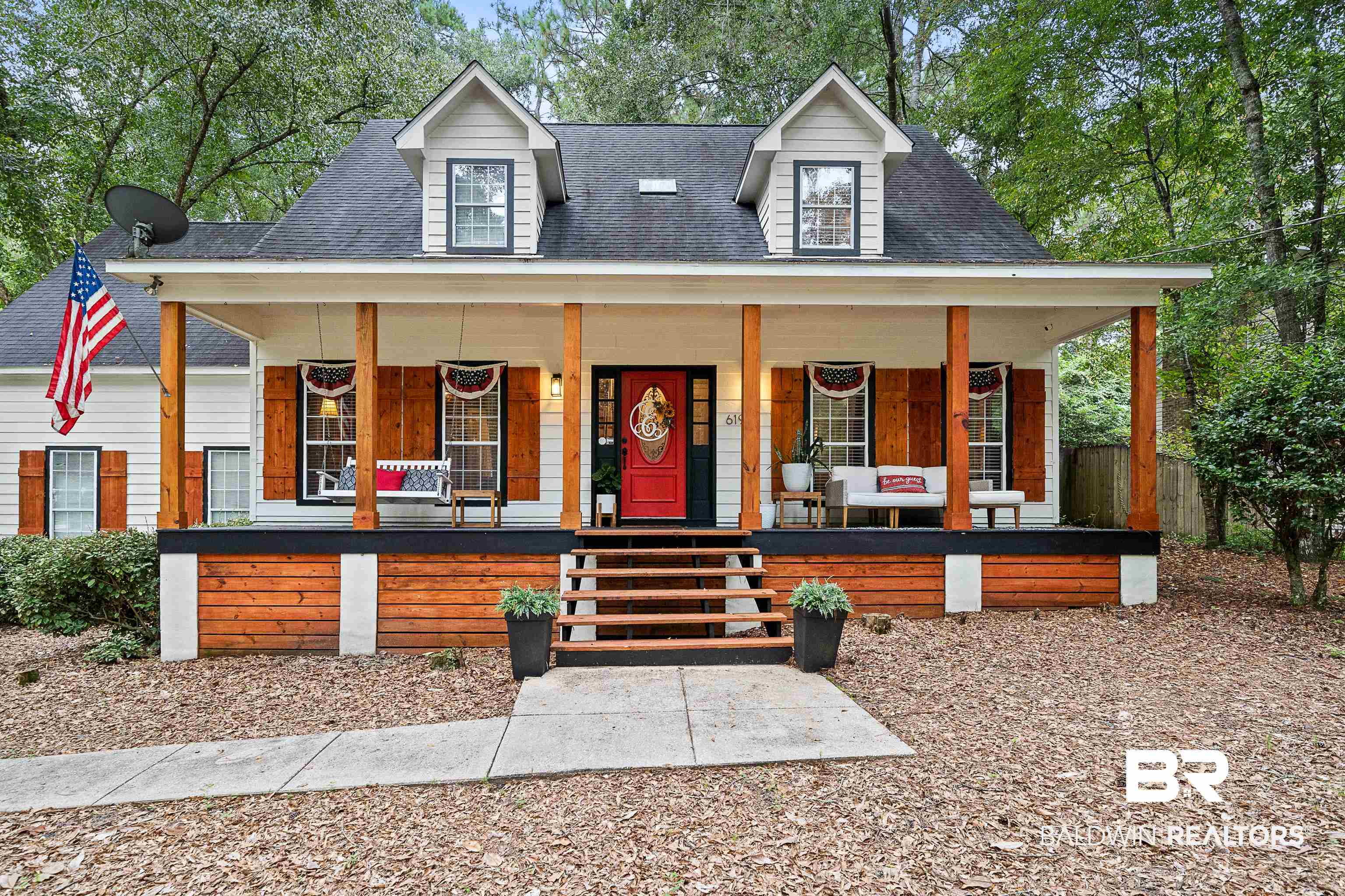 619 Ridgewood Drive Daphne, AL 36526 - Photo 1 of 47 View of front facade with roof with shingles and a porch