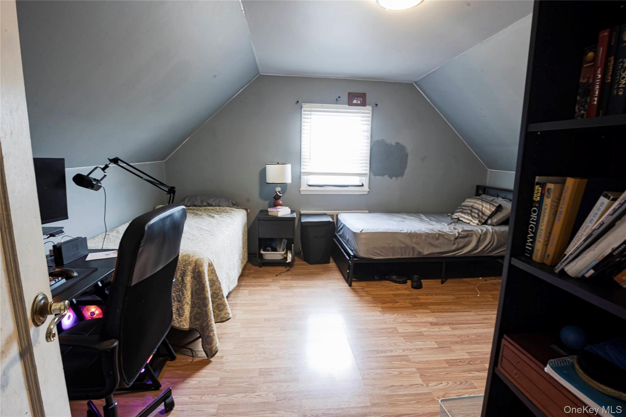 2687 Fox Road Baldwin, NY 11510 - Photo 16 of 27 a bedroom with a bed and a window
