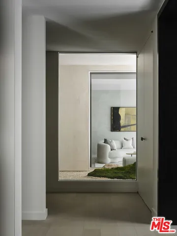 a room with a mirror and a bench