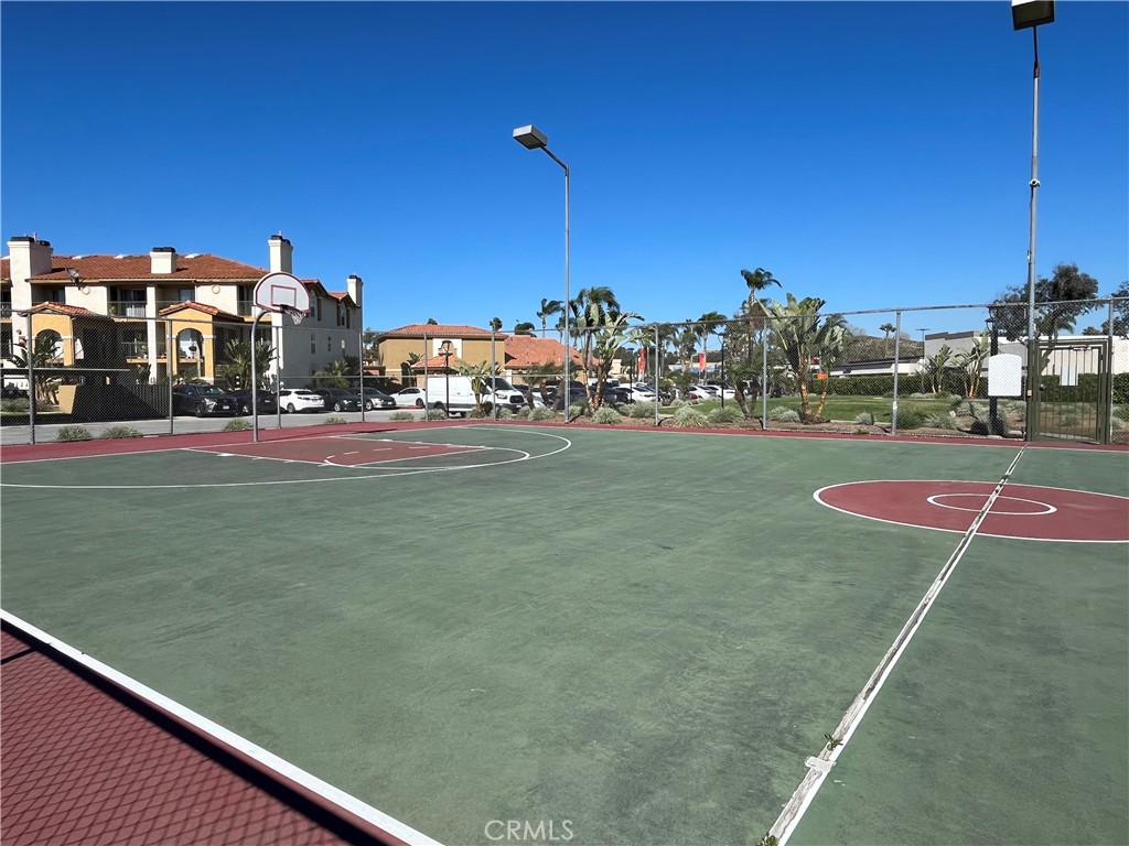 2160 Highpointe Drive, Unit 112 Corona, CA 92879 - Photo 17 of 21 a view of a tennis ground with large trees