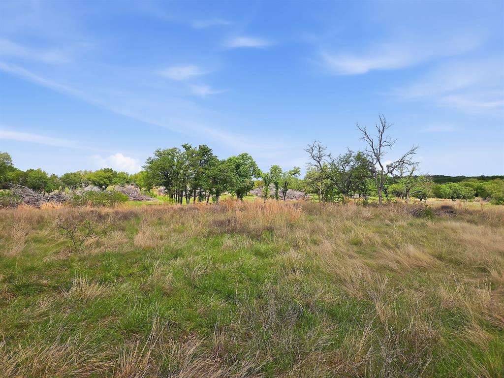Lot 73-74 Lot Evant, TX 76525 - Photo 15 of 31 a view of mountain with lake in background