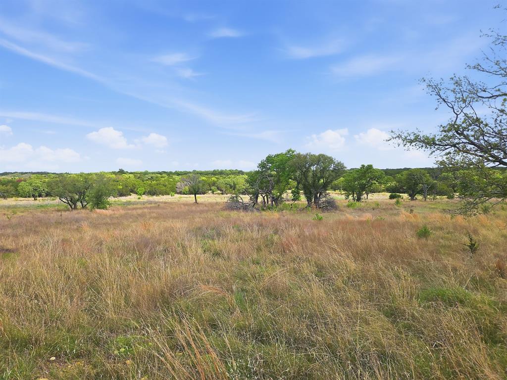 Lot 73-74 Lot Evant, TX 76525 - Photo 16 of 31 a view of lake with green space