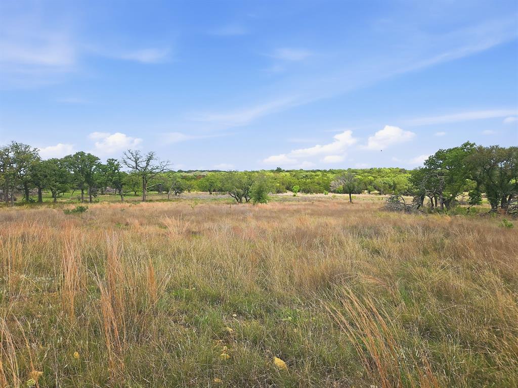 Lot 73-74 Lot Evant, TX 76525 - Photo 17 of 31 a view of lake with sunset