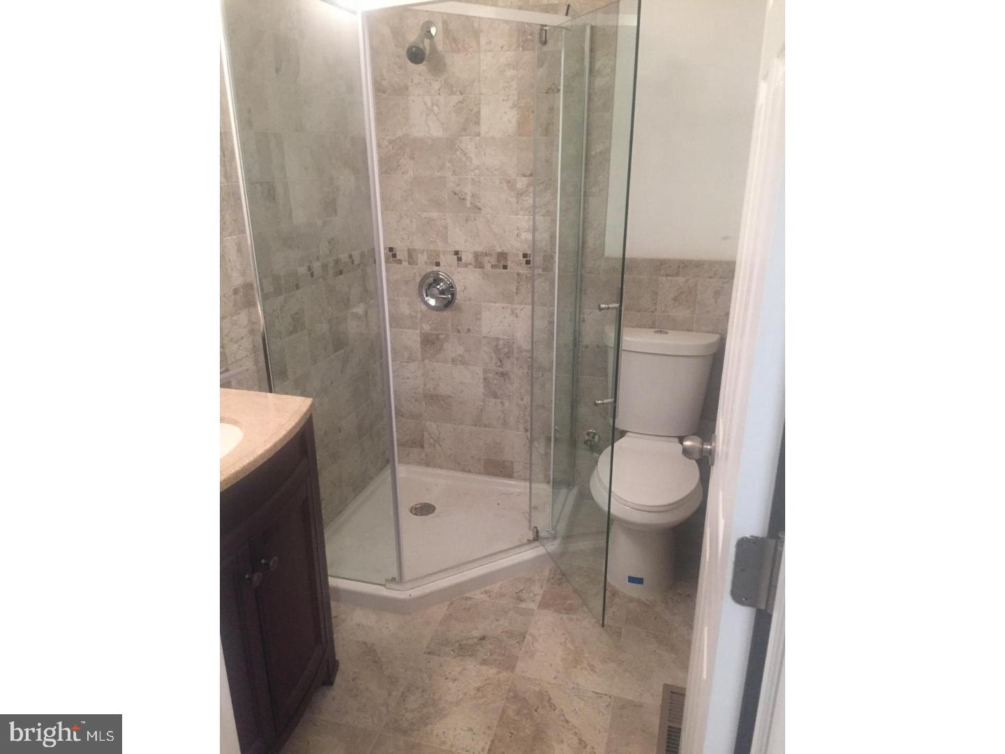 7 East Roland Avenue Maple Shade, NJ 08052 - Photo 5 of 6 a bathroom with a shower and toilet