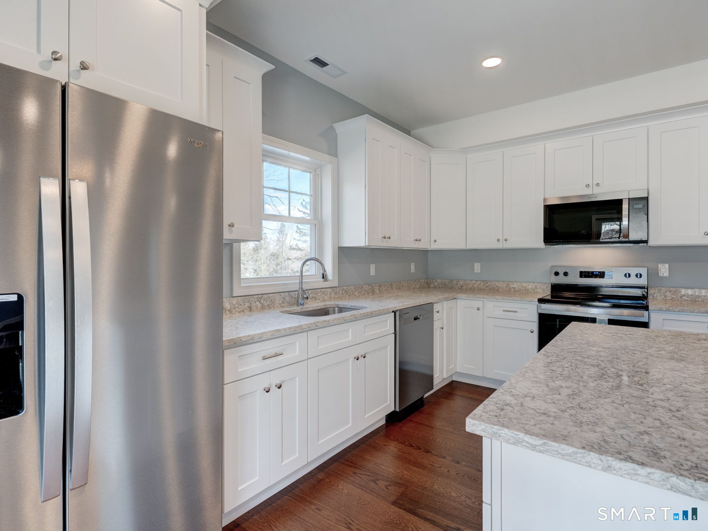 28 Goodell Road Stafford, CT 06076 - Photo 14 of 40 a kitchen with stainless steel appliances granite countertop a refrigerator sink and stove