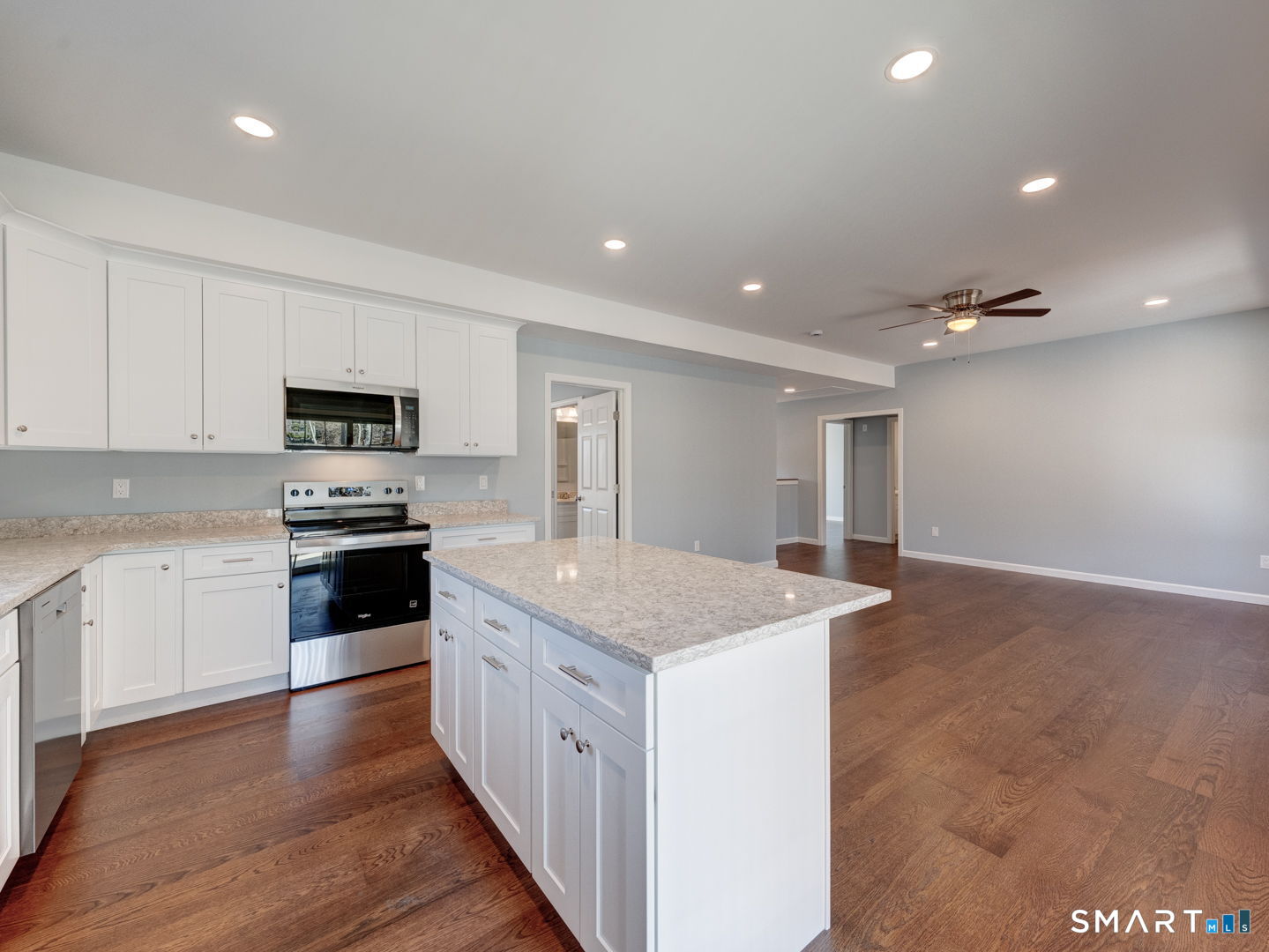 28 Goodell Road Stafford, CT 06076 - Photo 15 of 40 a kitchen with stainless steel appliances granite countertop a sink stove and microwave