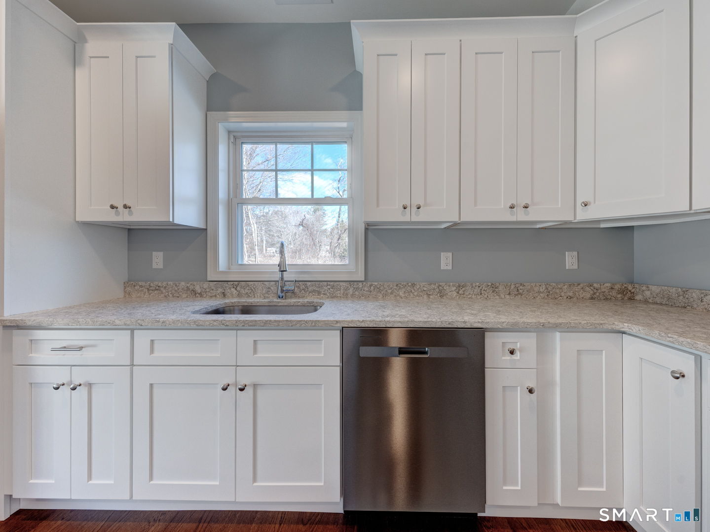 28 Goodell Road Stafford, CT 06076 - Photo 19 of 40 a kitchen with granite countertop white cabinets and sink
