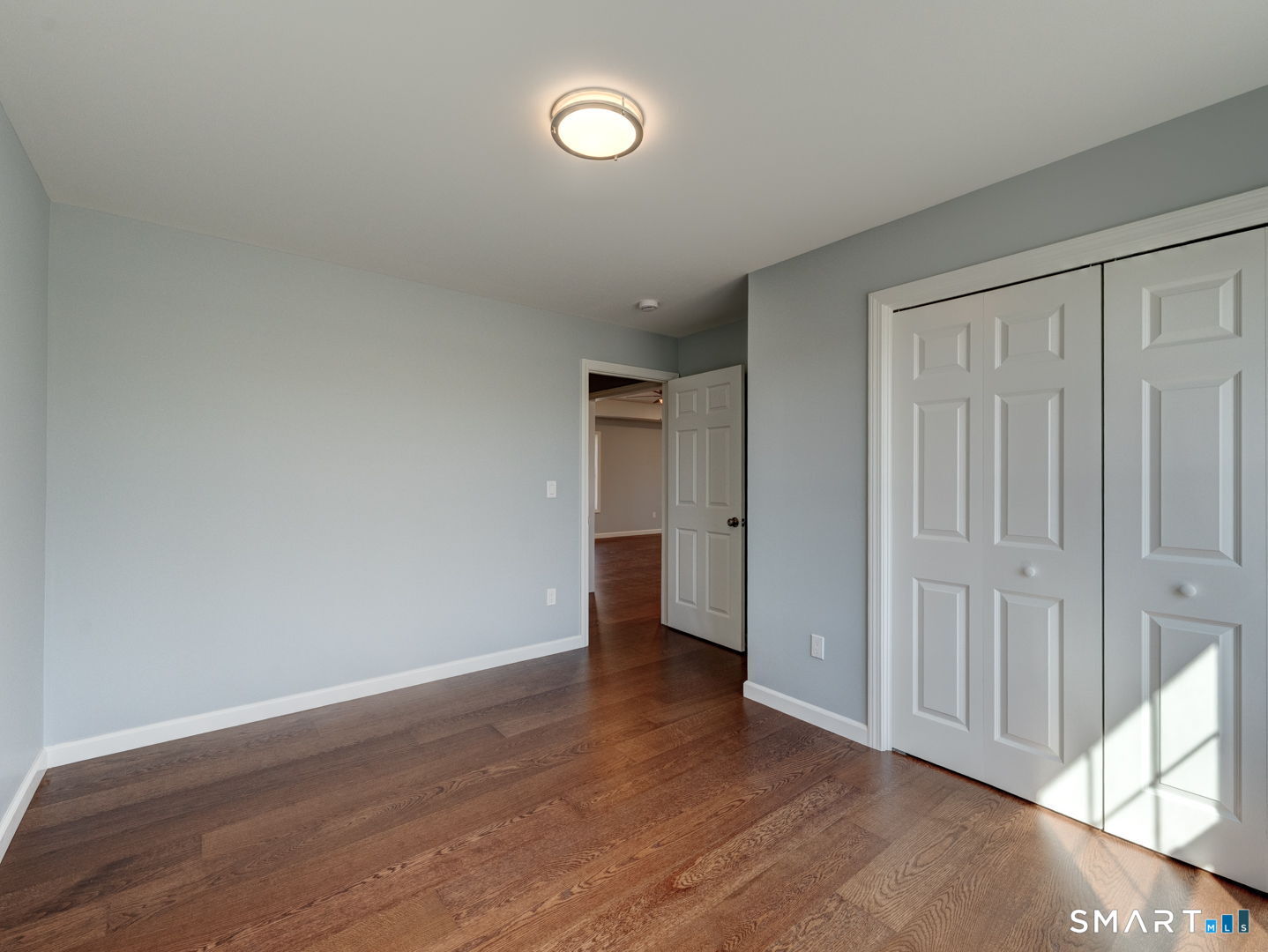 28 Goodell Road Stafford, CT 06076 - Photo 30 of 40 a view of an empty room with wooden floor