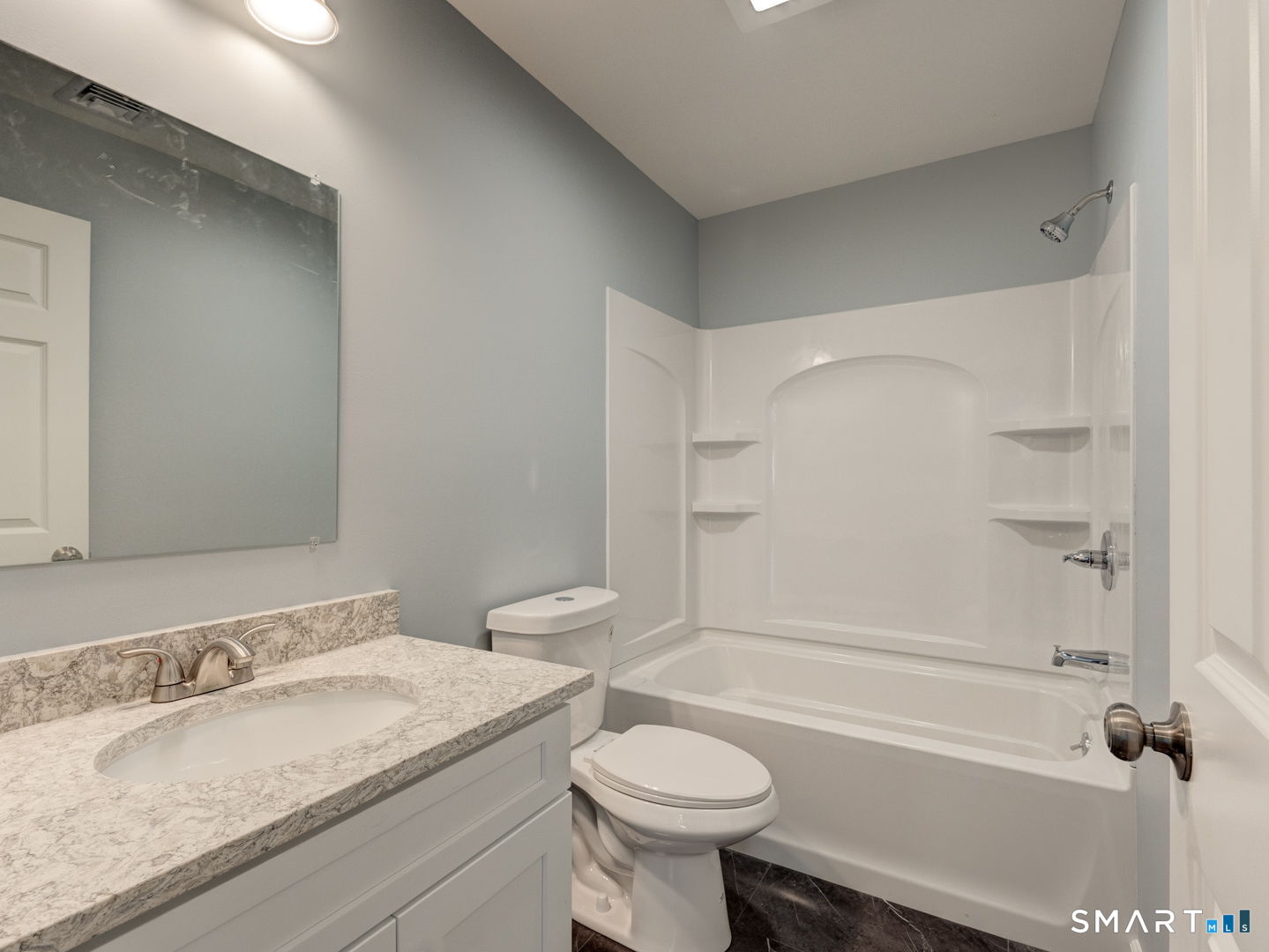 28 Goodell Road Stafford, CT 06076 - Photo 34 of 40 a bathroom with a sink toilet and shower