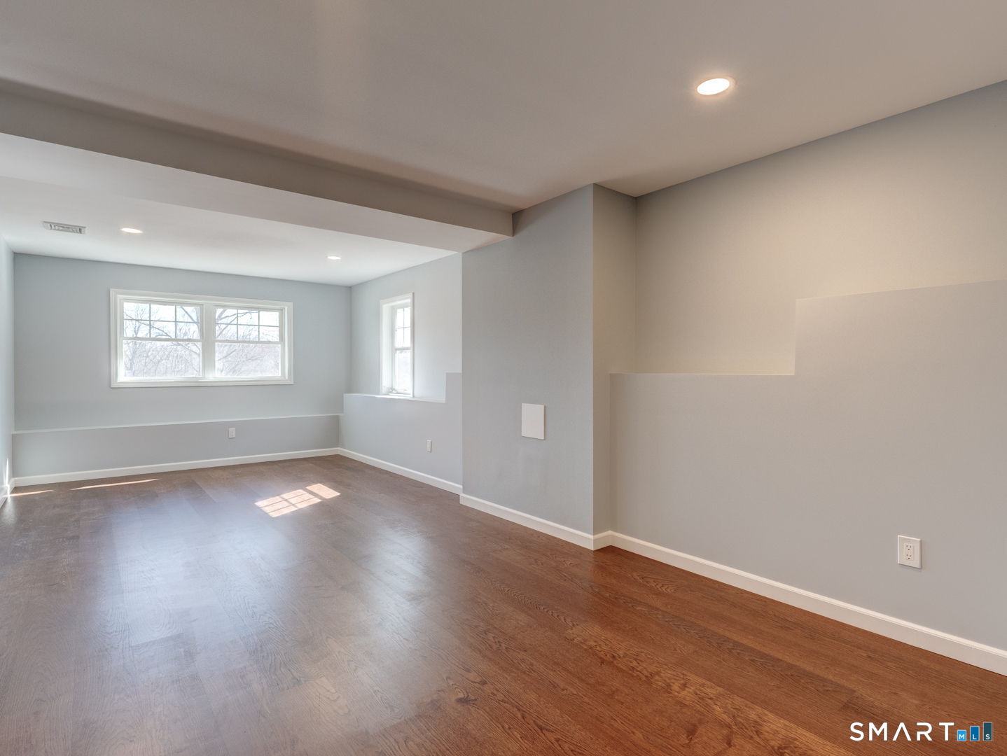 28 Goodell Road Stafford, CT 06076 - Photo 38 of 40 an empty room with wooden floor and windows