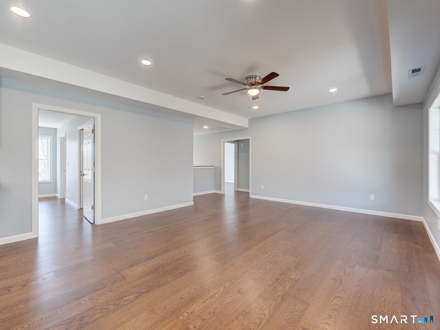 28 Goodell Road Stafford, CT 06076 - Photo 9 of 40 a view of an empty room with wooden floor and ceiling fan
