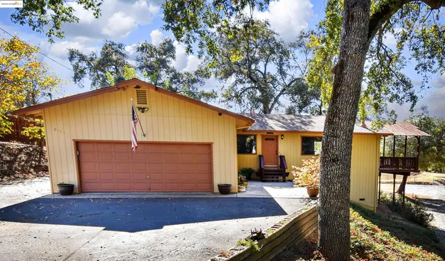 a front view of house with yard