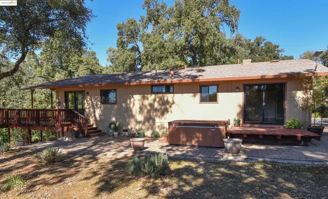 a view of a car park in front of house