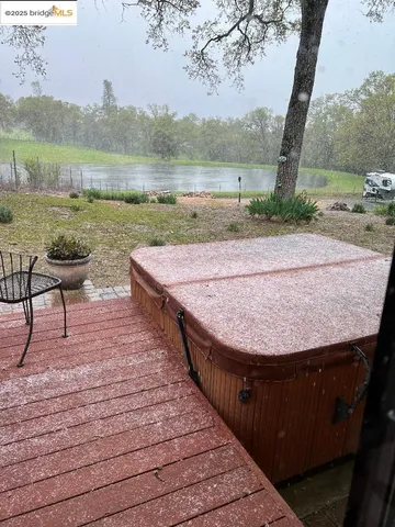 a view of a terrace with lake view