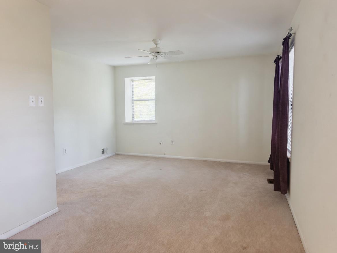 2 Goshawk Court Voorhees, NJ 08043 - Photo 20 of 33 an empty room with a empty space and windows