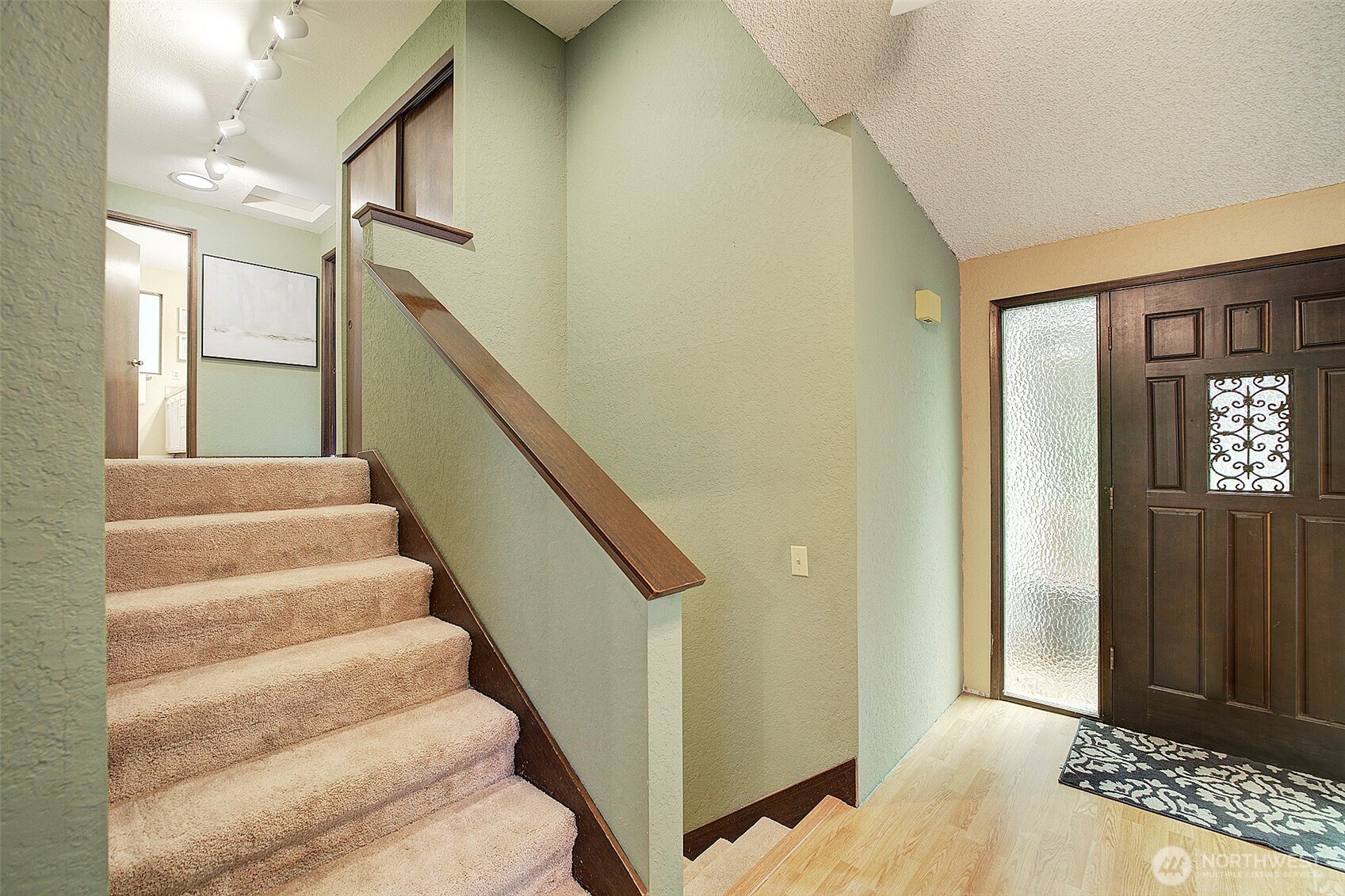 22710 2nd Avenue Southeast Bothell, WA 98021 - Photo 14 of 34 a view of entryway and hall with wooden floor