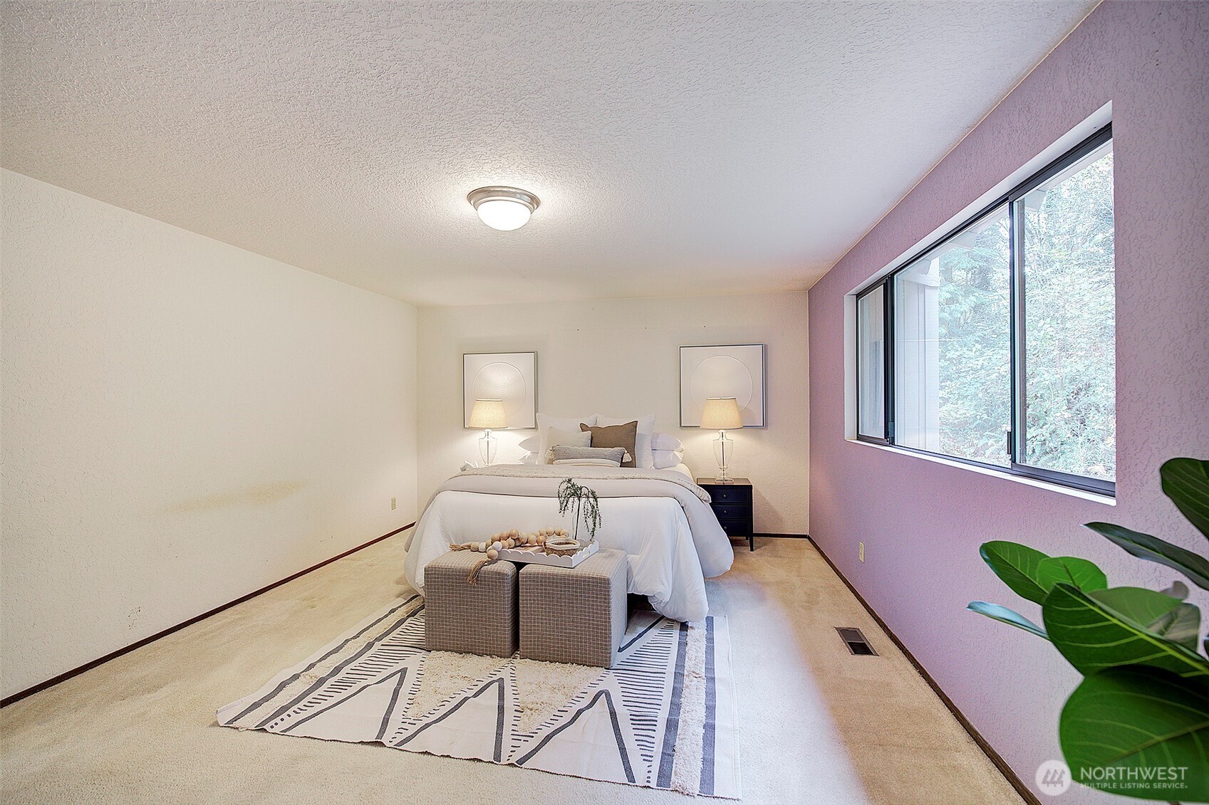 22710 2nd Avenue Southeast Bothell, WA 98021 - Photo 17 of 34 a bedroom with a bed window and couch