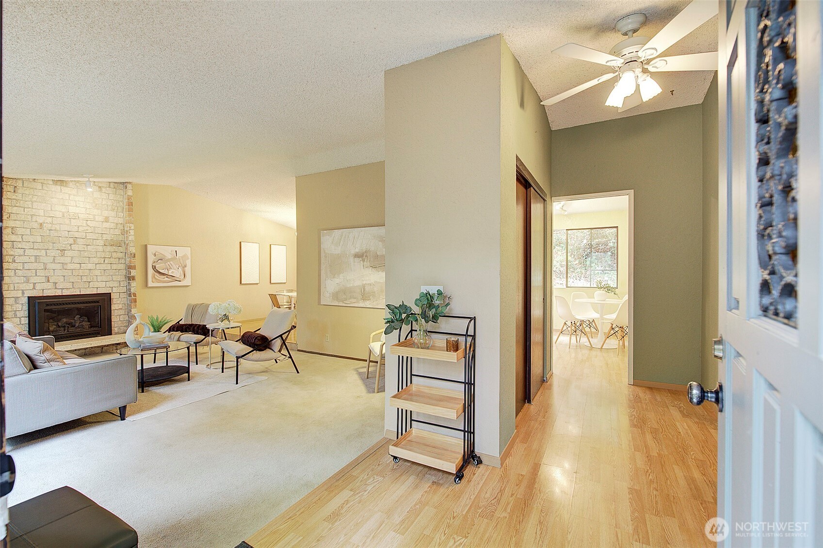 22710 2nd Avenue Southeast Bothell, WA 98021 - Photo 2 of 34 a living room with furniture and a fireplace