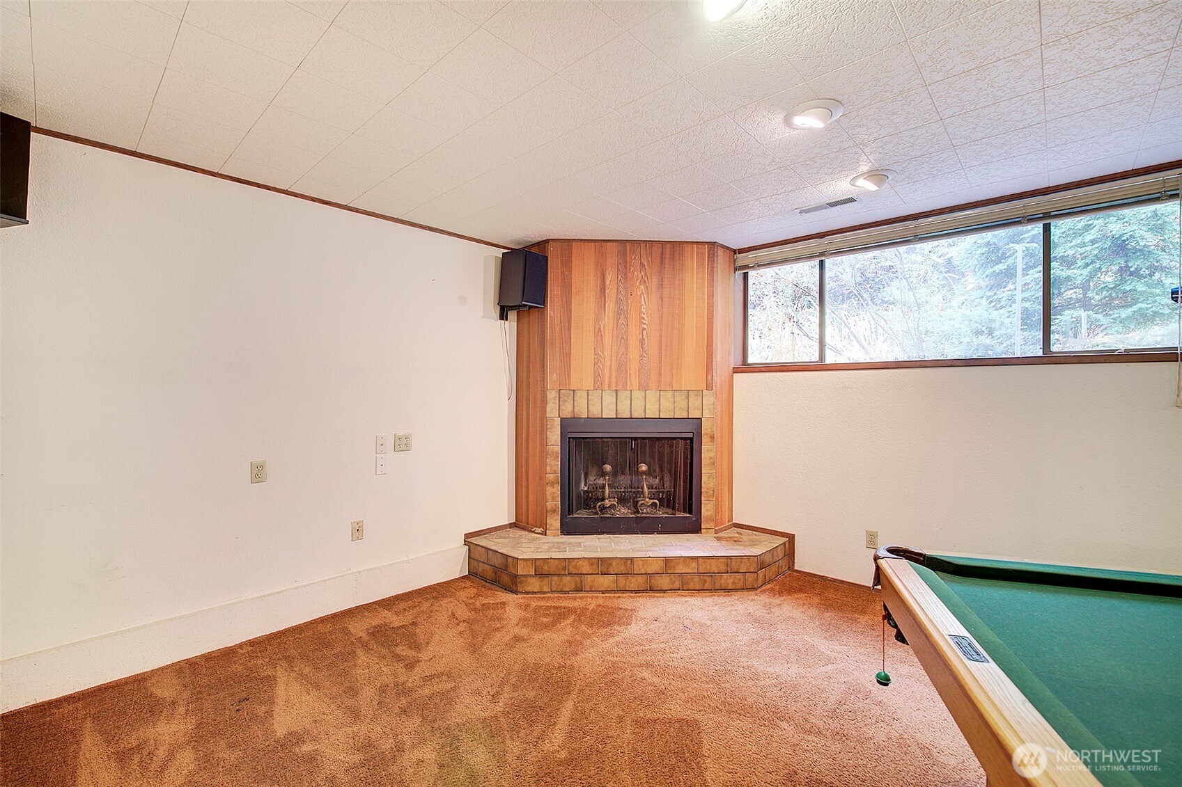 22710 2nd Avenue Southeast Bothell, WA 98021 - Photo 26 of 34 a view of an empty room with a fireplace and a window