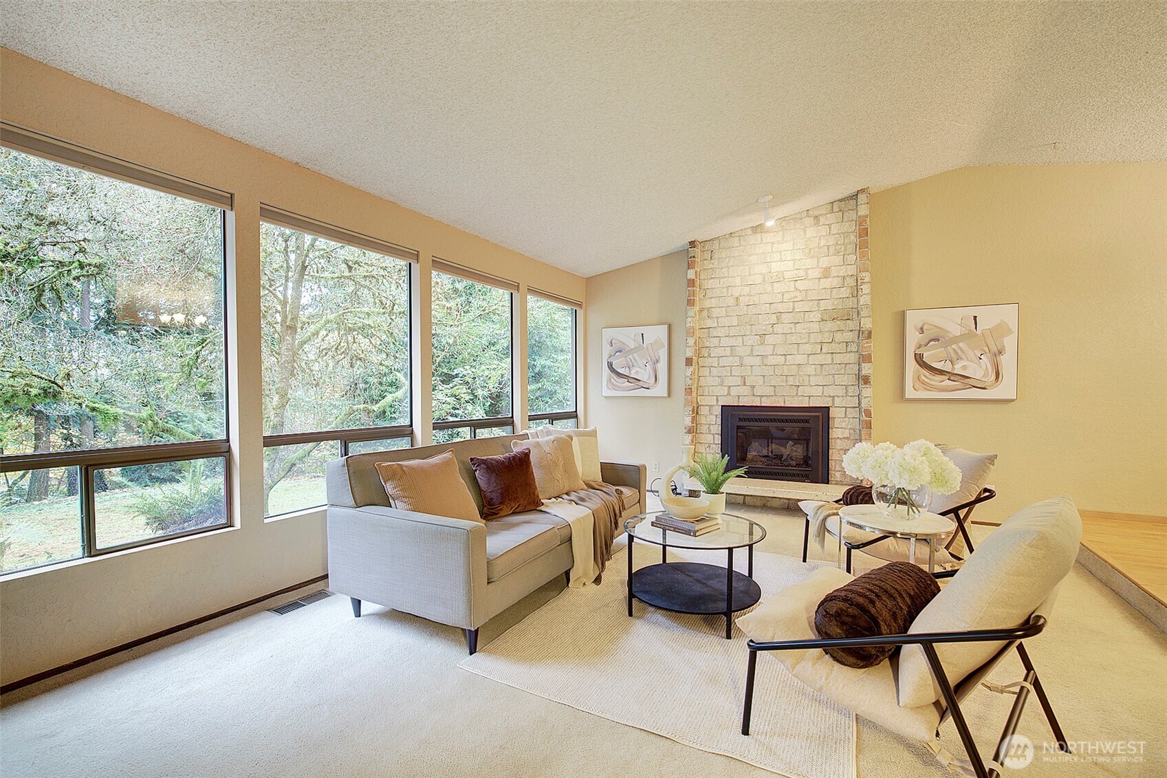 22710 2nd Avenue Southeast Bothell, WA 98021 - Photo 4 of 34 a living room with furniture and a fireplace