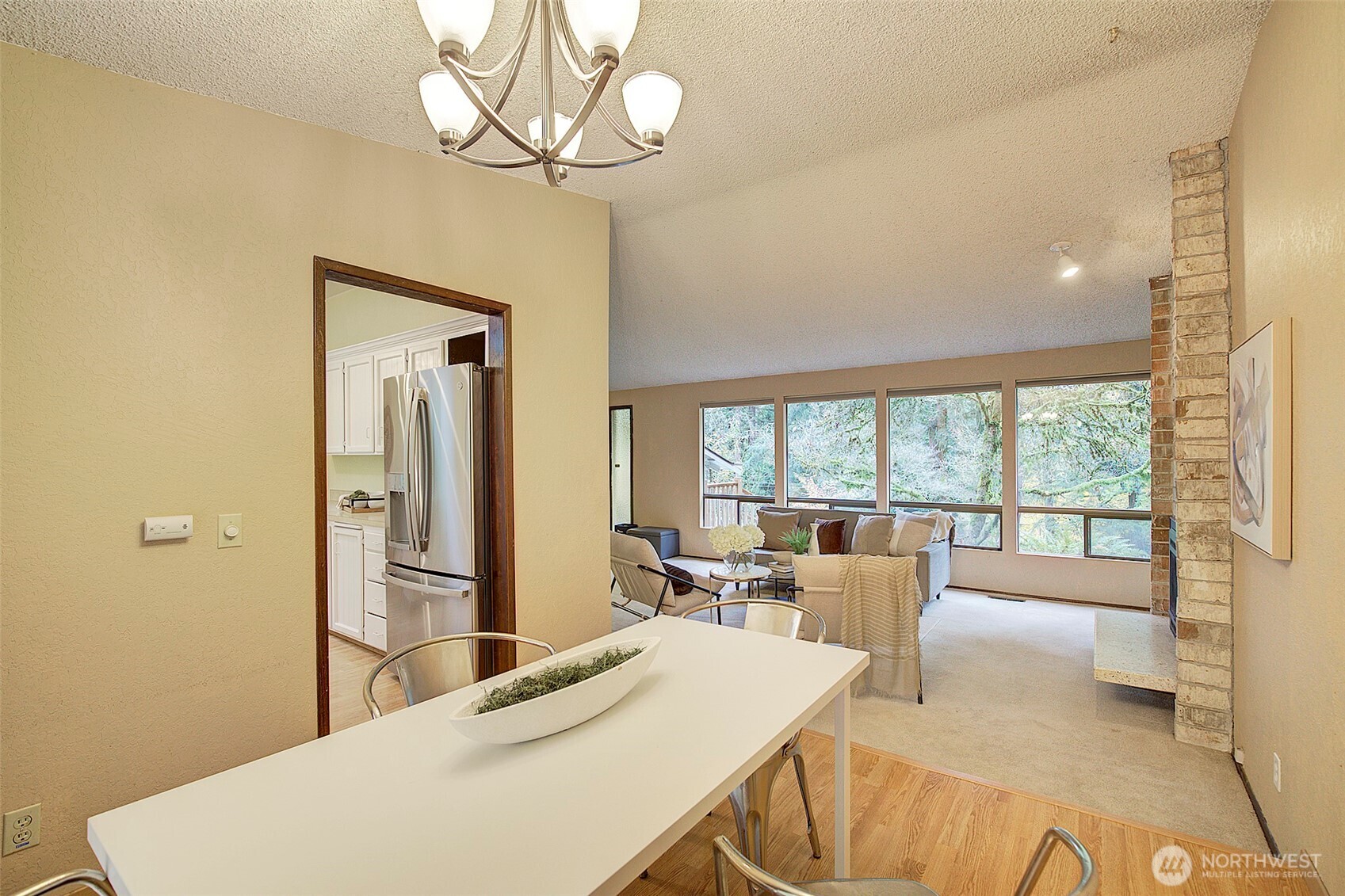 22710 2nd Avenue Southeast Bothell, WA 98021 - Photo 7 of 34 a living room with stainless steel appliances granite countertop furniture and a large window