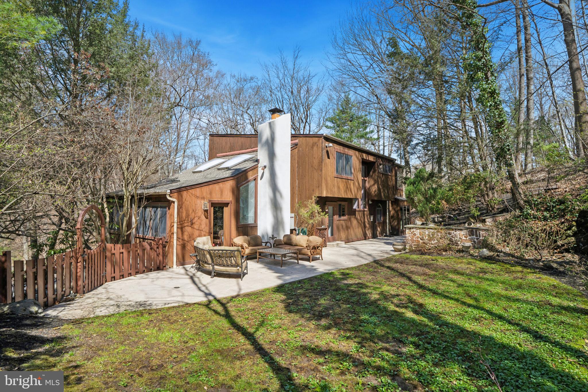 1343 Centennial Road Penn Valley, PA 19072 - Photo 35 of 36 a view of a house with backyard and sitting area
