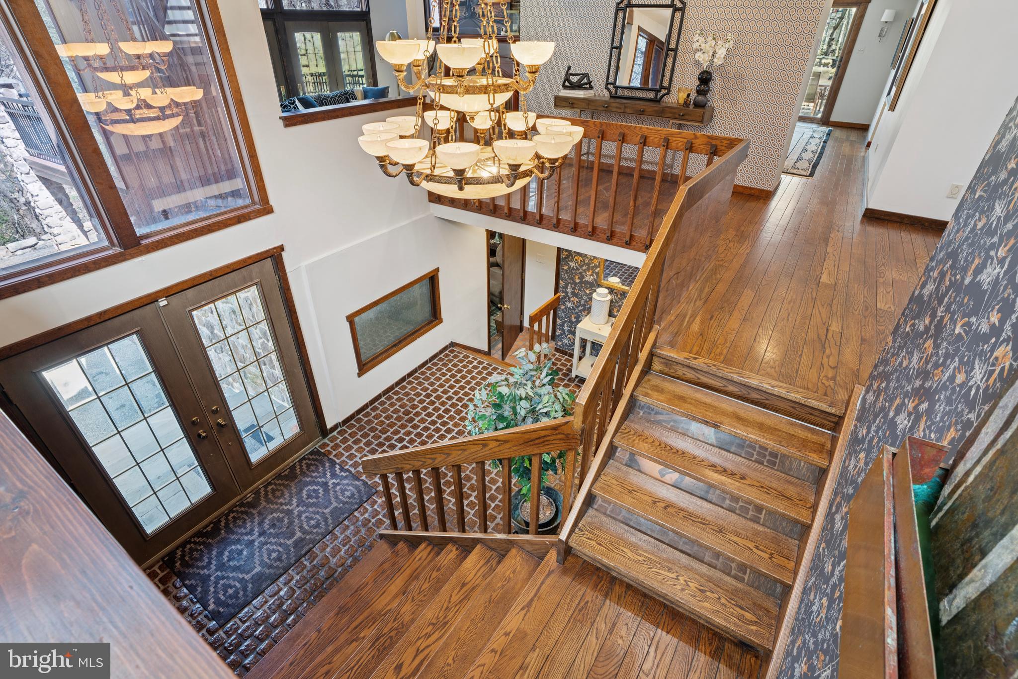 1343 Centennial Road Penn Valley, PA 19072 - Photo 6 of 36 a view of stairs with wooden floor