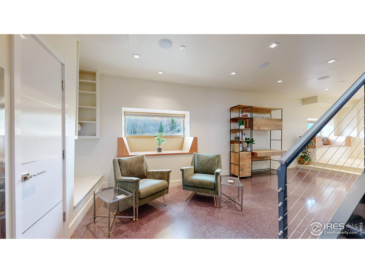 987 Lost Angel Road Boulder, CO 80302 - Photo 20 of 40 a living room with furniture and a wooden floor