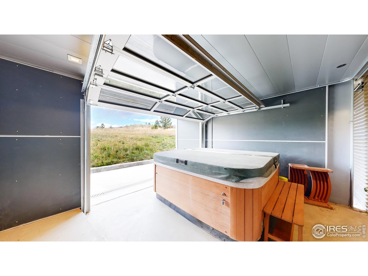 987 Lost Angel Road Boulder, CO 80302 - Photo 24 of 40 a bathroom with a sink a vanity and a large window