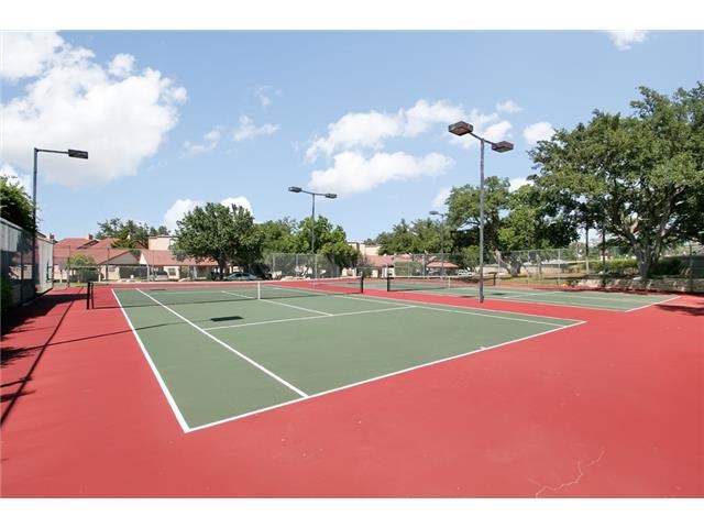 2918 Ranch Road 620, Unit K170 Austin, TX 78734 - Photo 18 of 22 Serve up some fun on these well-maintained, ready-to-play tennis courts.