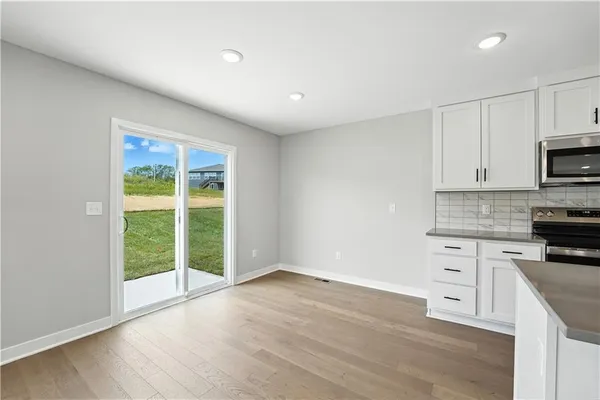 $409,988 | 707 Glenn Circle, Raymore, MO 64083