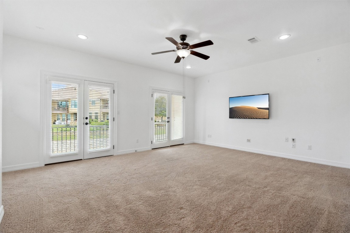 111 ANTONIO Way, Unit 5A Austin, TX 78734 - Photo 28 of 40 a view of an empty room with a window