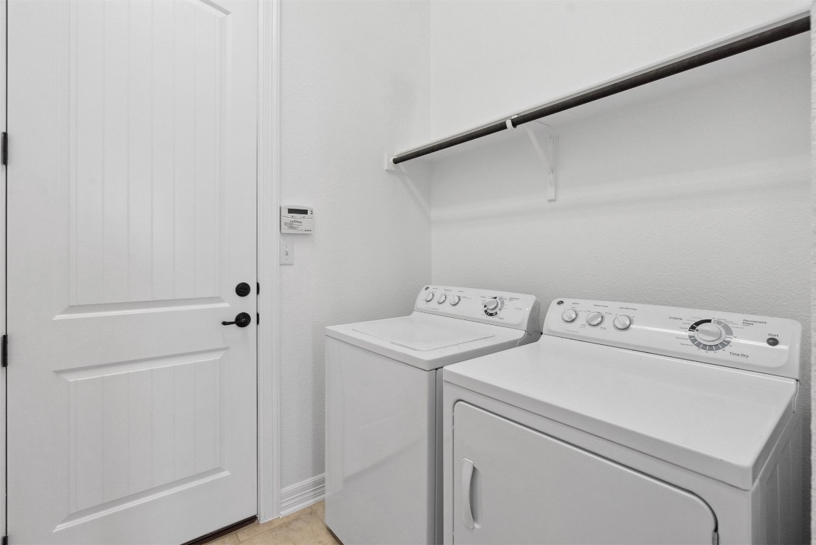 111 ANTONIO Way, Unit 5A Austin, TX 78734 - Photo 35 of 40 a utility room with dryer and washer