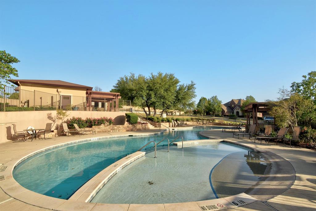 111 ANTONIO Way, Unit 5A Austin, TX 78734 - Photo 40 of 40 a view of a swimming pool with a patio