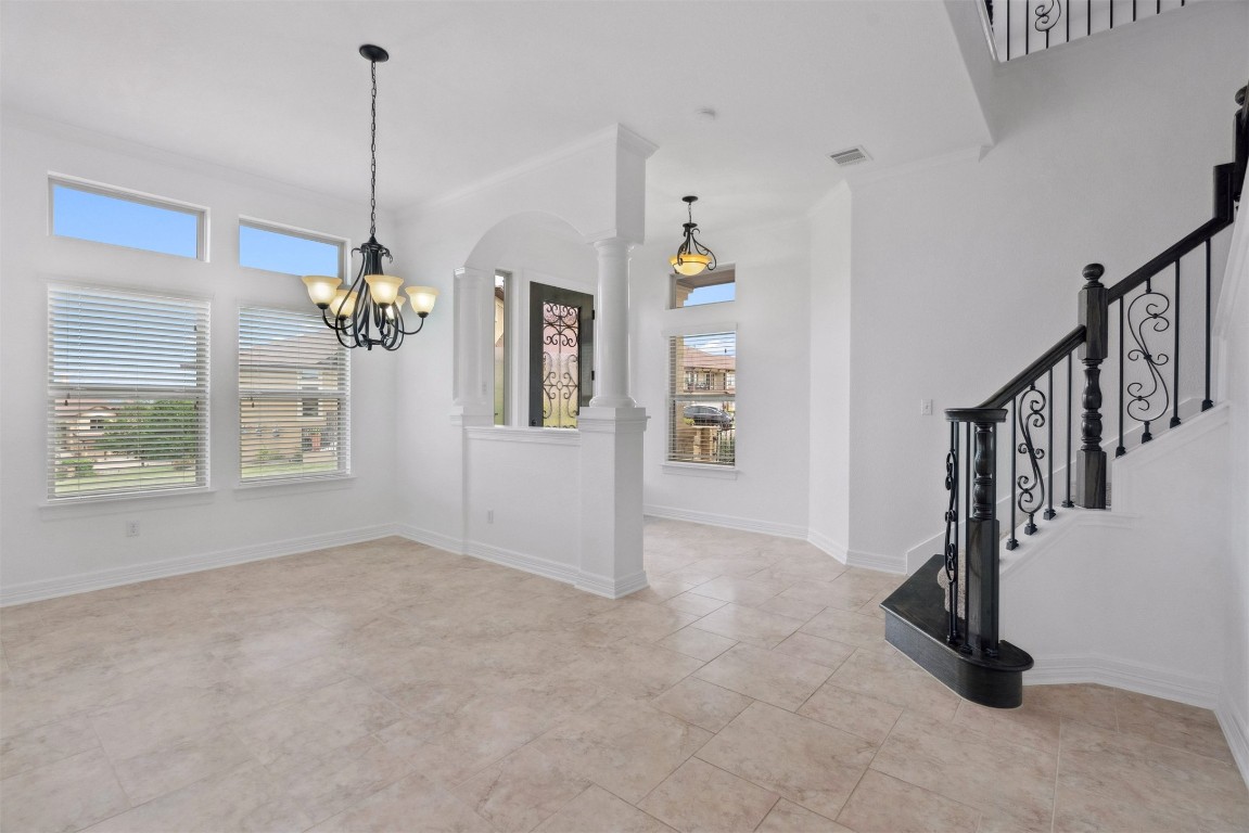 111 ANTONIO Way, Unit 5A Austin, TX 78734 - Photo 10 of 40 a view of an empty room with a window