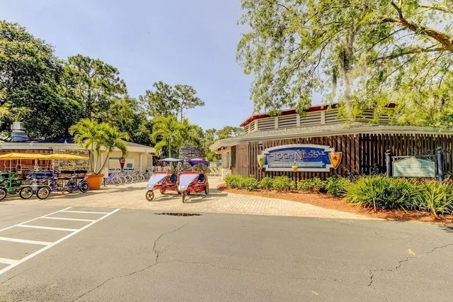 a view of a street with cars on the road