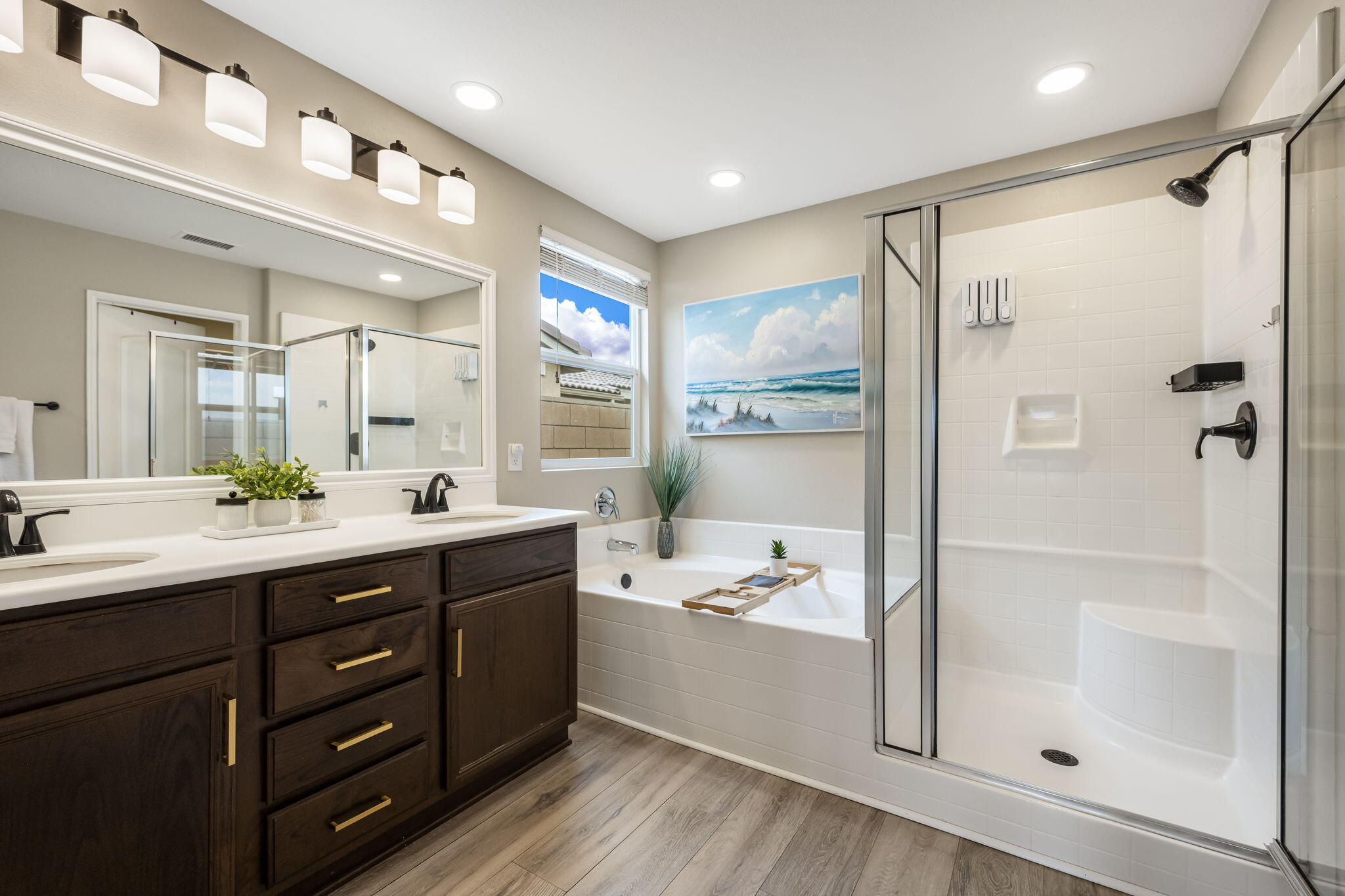 84131 Azzura Way Indio, CA 92203 - Photo 15 of 38 a bathroom with a double vanity sink mirror and shower