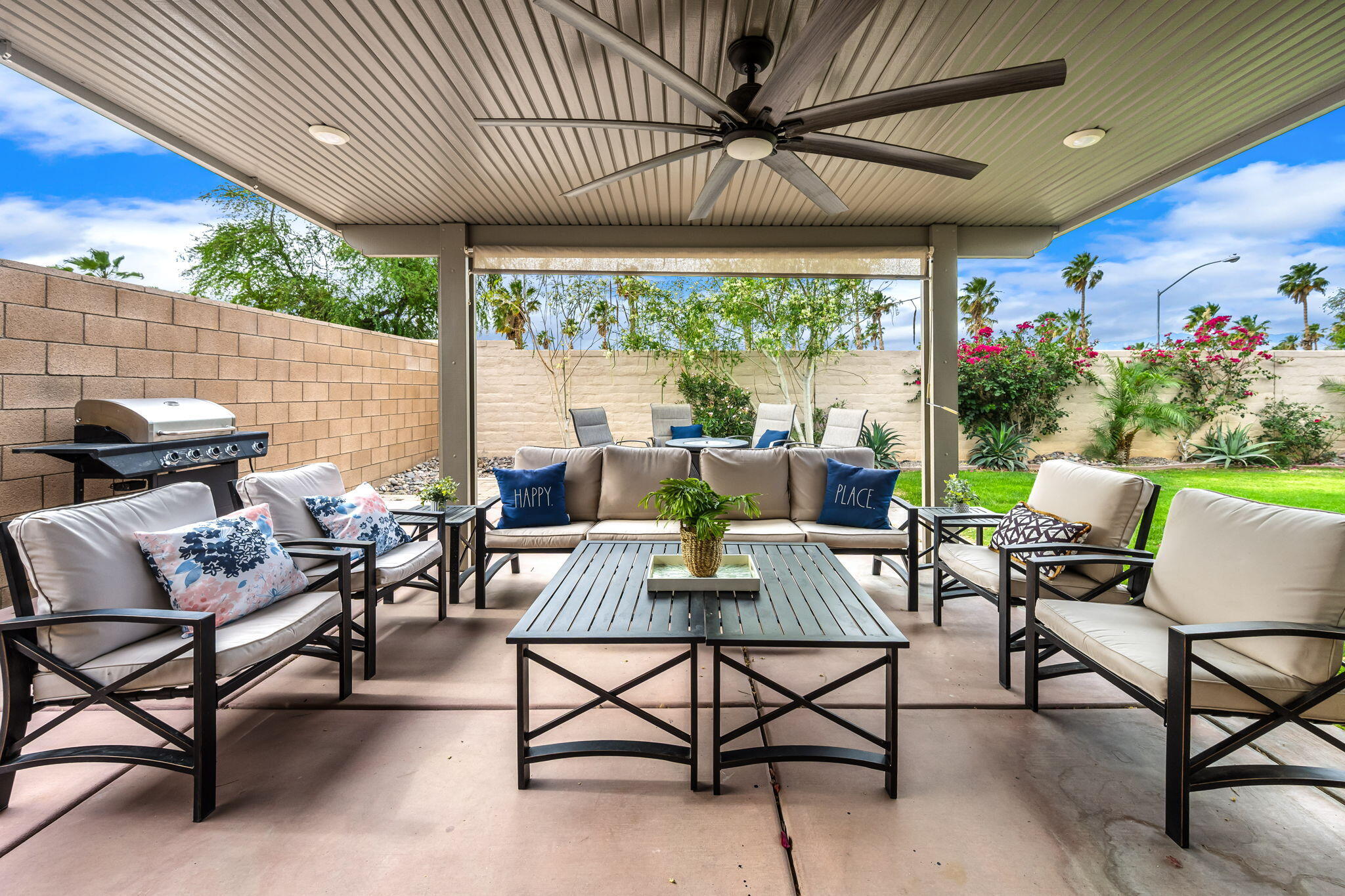 84131 Azzura Way Indio, CA 92203 - Photo 22 of 38 a view of a patio with a table and chairs