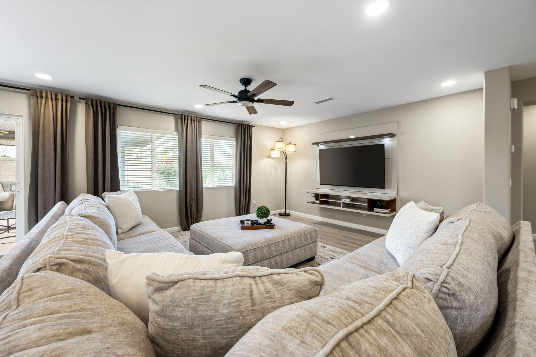 84131 Azzura Way Indio, CA 92203 - Photo 3 of 38 a living room with furniture and a flat screen tv