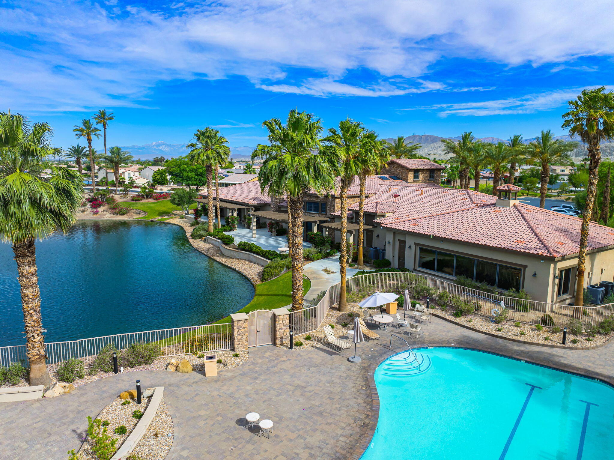 84131 Azzura Way Indio, CA 92203 - Photo 35 of 38 a view of swimming pool with outdoor seating