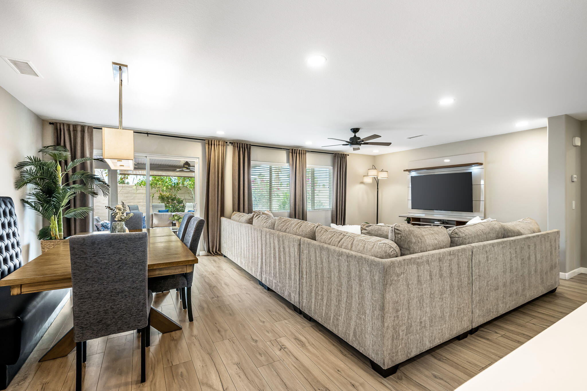 84131 Azzura Way Indio, CA 92203 - Photo 4 of 38 a living room with furniture and a flat screen tv