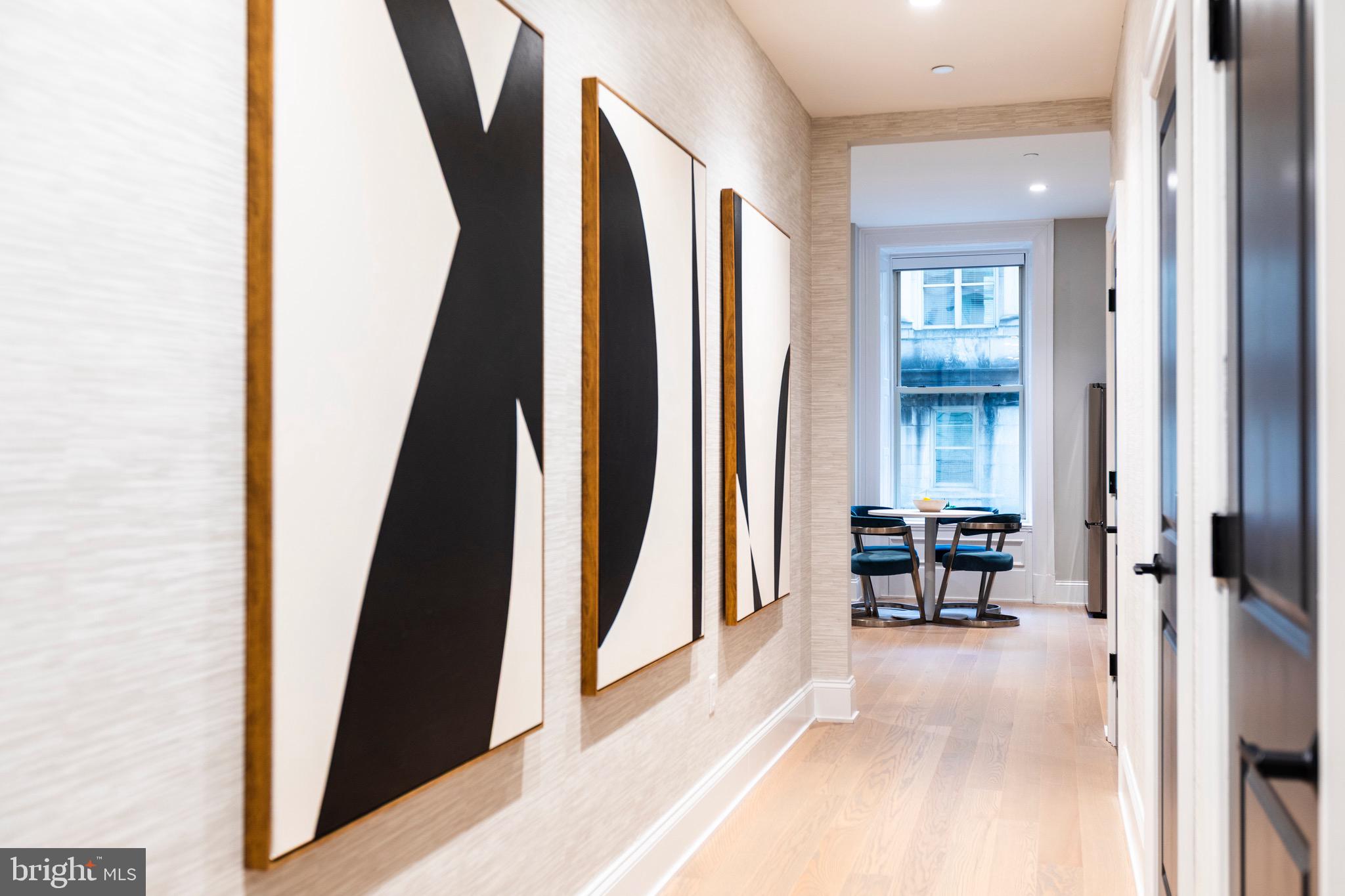 200 South Broad Street, Unit 206 Philadelphia, PA 19102 - Photo 12 of 55 a view of a living room with furniture and a window