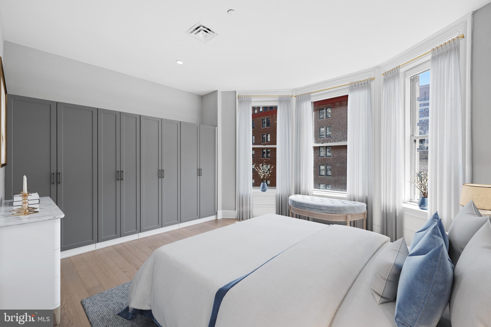 200 South Broad Street, Unit 206 Philadelphia, PA 19102 - Photo 24 of 55 a bedroom with a bed and a window