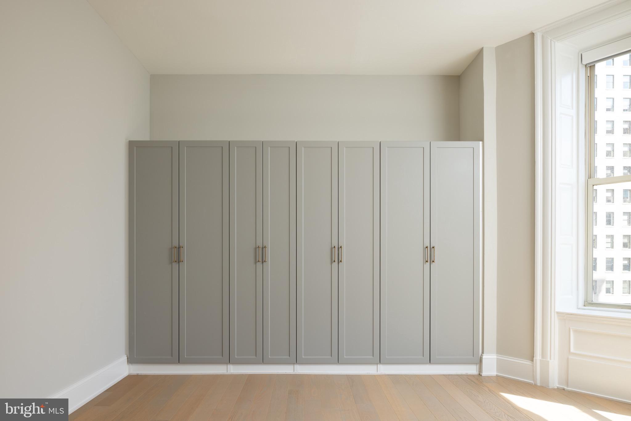 200 South Broad Street, Unit 206 Philadelphia, PA 19102 - Photo 25 of 55 a view of an empty room with wooden floor