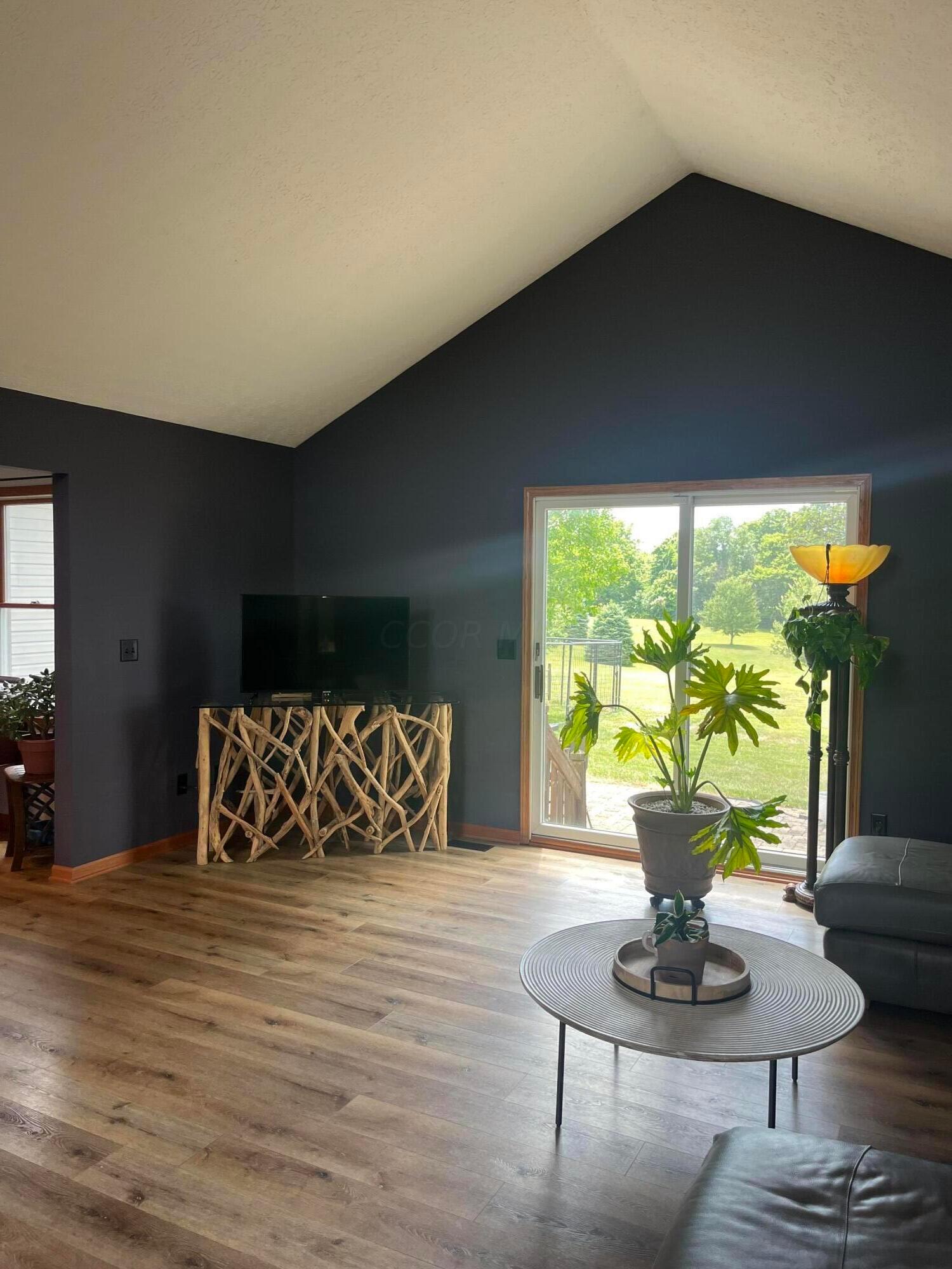 8857 Ringgold Fairfield Road Circleville, OH 43113 - Photo 7 of 36 Living room with sliding glass door to patio