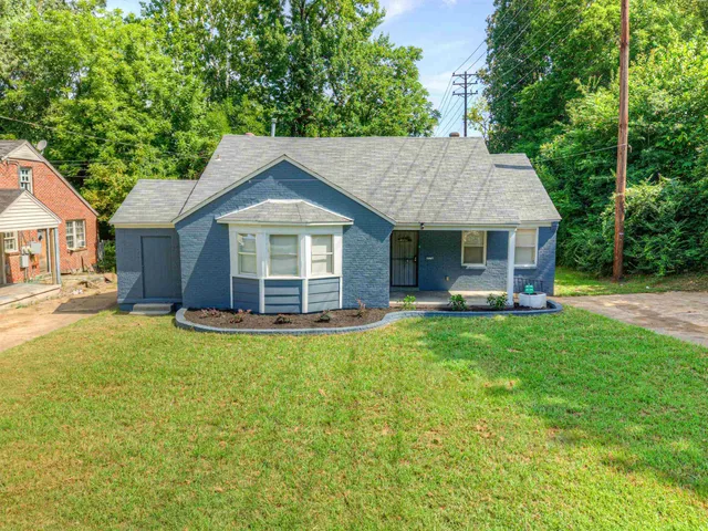 a house view with a garden space