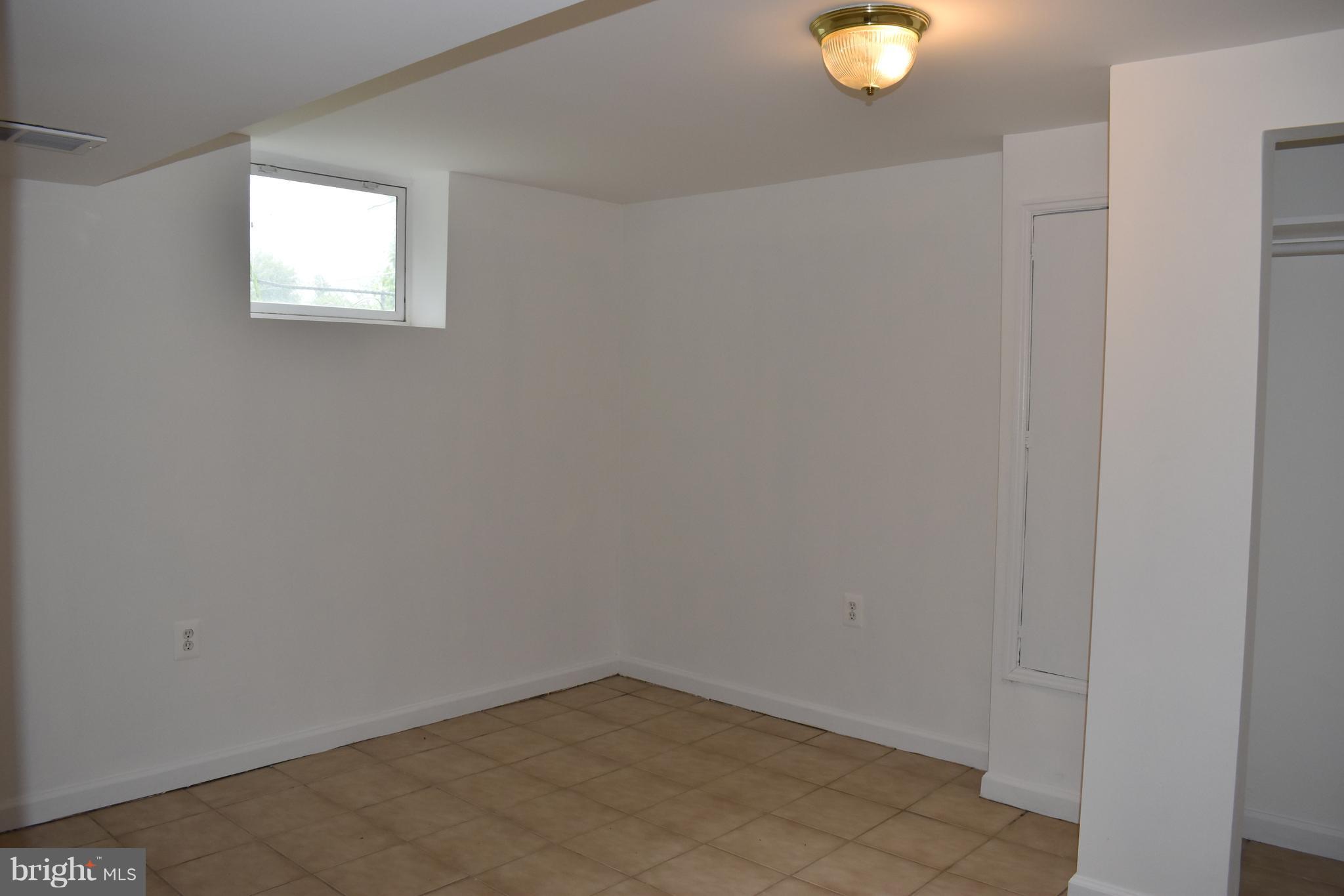 11505 Goodloe Road Silver Spring, MD 20906 - Photo 12 of 25 an empty room with window