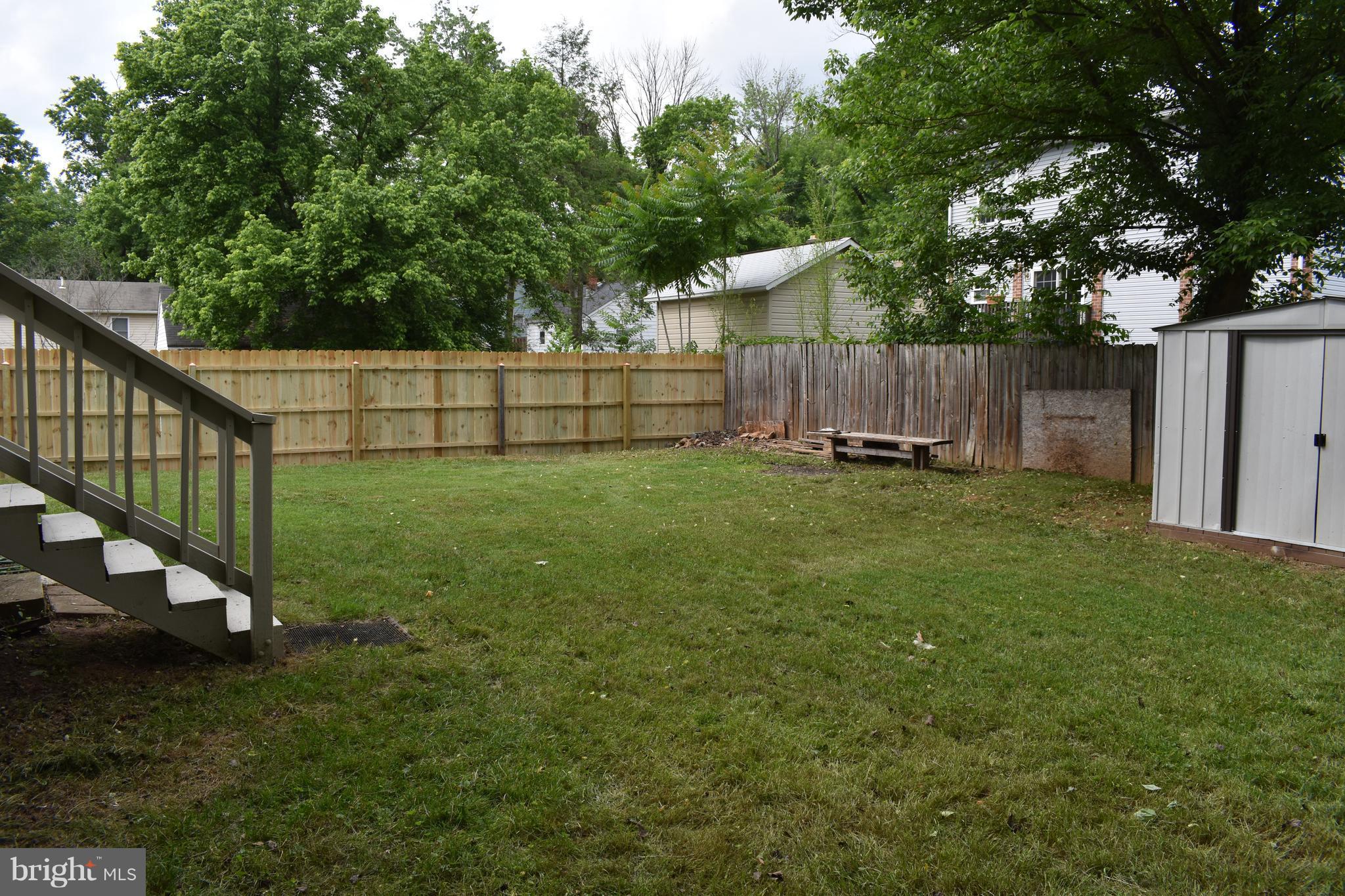 11505 Goodloe Road Silver Spring, MD 20906 - Photo 15 of 25 a view of a backyard with a small cabin